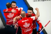 La joie des Canadiens Geoff Walker, Brad Gushue, Mark Nichols et Brett Gallant, après avoir remporté la médaille de bronze en curling face aux Etats-Unis, le 18 février 2022 aux Jeux olympiques de Pékin