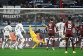 Le gardien de but Paul Nardi encaisse un but, lors de la défaite de Lorient, 4-1 face à Metz, lors de la 18e journée de Ligue 1, le 12 décembre 2021 au Stade Saint-Symphorien