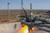 Capture d'image d'une vidéo diffusée le 9 août 2022 par l'agence spatiale russe Roscosmos montrant le lancement d'une fusée Soyouz transportant le satellite iranien Khayyam