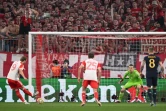 L'avant-centre du Bayern Harry Kane marque sur pénalty contre le Real Madrid en demi-finale de Ligue des champions mardi à l'Allianz Arena de Munich.