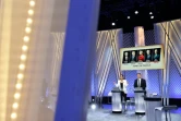 Les journalistes Léa Salamé (g) et Laurent Guimier lors du débat entre les candidats LR à l'investiture à la présidentielle de 2022, à Paris le 30 novembre 2021