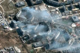 Image satellite Maxar montrant des imeubles en feu à Marioupol, sud-est de l'Ukraine, le 22 mars 2022
