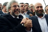 Les journalistes Can Dundar et Erdem Gul à leur arrivée au tribunal le 25 mars 2016 à Istanbul