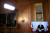 Le Premier ministre britannique Boris Johnson, en quarantaine, s'exprime par vidéoconférence, le 23 novembre 2020 à Londres