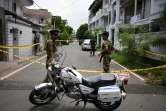 Des forces de sécurité entourent le 23 avril 2019 la maison d'un kamikaze présumé après les attentats de Colombo