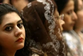 Des chrétiens d'Irak assistent à une messe à Erbil le 25 octobre 2016