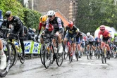 Les coureurs sous la pluie glacée lors de La Flèche Wallonne, le 17 avril 2024 entre Charleroi et Huy 