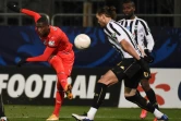 L'attaquant rennais Serhou Guirassy (g) marque sur le terrain d'Angers en Coupe de France, le 11 février 2021