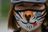 Une femme masquée le 3 avril 2020 à Wuhan