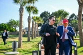 Elon Musk accueille le président élu américain, Donald Trump, pour assister au lancement du sixième vol d'essai de la fusée Starship de SpaceX, le 19 novembre 2024 à Brownsville, au Texas