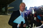 Le négociateur de l'UE sur le Brexit Michel Barnier (c) répond aux questions des journalistes, le 28 octobre 2019 à Bruxelles