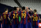 Les Barcelonais célèbrent leur victoire sur les Parisiens en demi-finale de la Ligue des Champions de handball, le 28 décembre 2020 à Cologne en Allemagne