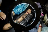 Plus de 100 tatoueurs sont présents à la 7e Foire du tatouage de Hong Kong, en Chine, jusqu'à dimanche