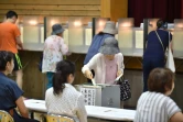 Un bureau de vote à Tokyo le 10 juillet 2016