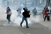 Des opposants honduriens protestent contre la réelection du président Juan Orlando Hernandez, le 27 janvier 2018 à Tegucigalpa