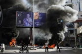 Des jeunes Palestiniens brûlent des pneus lors d'affrontements avec les forces israéliennes à Jénine, le 8 novembre 2023 en Cisjordanie occupée
















