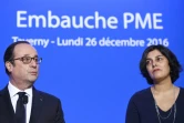 François Hollande et la ministre du Travail Myriam lors d'une visite à l'usine ETNA le 26 décembre 2016 à Taverny 