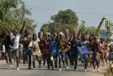 Des partisans de l'ex-président ivoirien Laurent Gbagbo expriment leur joie à Divo en Côte d'Ivoire après l'annonce de son acquittement par la Cour pénale internationale (CPI) le 15 janvier 2019