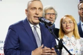 Le chef de la Coalition civique (KO), principale formation d'opposition en Pologne, Grzegorz Schetyna, s'exprime devant ses partisants au soir des élections législatives, à Varsovie le 13 octobre 2019
