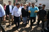 Angela Merkel et Armin Laschet parlent avec des sinistrés dans la la ville de Bad Munstereifel le 20 juillet 2021