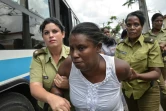 Des membres du groupe de dissidents cubains les Dames en blanc, rassemblant des femmes d'anciens détenus politiques, arrêtées le 20 mars 2016 pendant une manifestation à La Havane