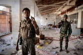 Des miliciens amhara dans l'aéroport dévasté de Lalibela, le 7 décembre 2021