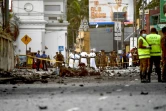Des débris d'une voiture dans une rue de Colombo au Sri Lanka, le 22 avril 2019