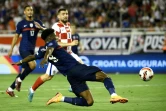 Le milieu de terrain français Aurélien Tchouameni (g) face à la Croatie, en Ligue des nations, le 6 juin 2022 à Split