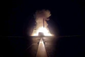 Photo fournie par le service de presse des armées françaises, le 14 avril 2018 du lancement d'un missile à partir d'un navire en Méditerranée pour cibler des sites militaires en Syrie