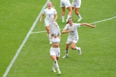 Les Anglaises euphoriques sur le but de Chloe Kelly (maillot enlevé) celui de la victoire contre l'Allemagne en finale de l'Euro à Wembley, le 31 juillet 2022 