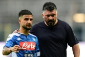 L'attaquant de Naples Lorenzo Insigne (g) et son entraîneur Gennaro Gattuso lors du match contre l'Atalanta, le 2 juillet 2020 à Bergame   