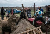 Funérailles le 18 avril 2022, de victimes tuées à Boutcha, près de Kiev, durant l'invasion de l'armée russe de l'Ukraine
