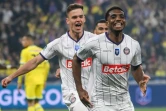 Les Toulousains Thijs Dallinga (g) et Logan Costa auteurs chacun d'un doublé contre Nantes en finale de Coupe de France, le 29 avril 2023 au Stade de France   