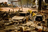 Une voiture brûlée par le Park Fire, dans le village de Paynes Creek en Californie, le 26 juillet 2024