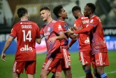 Les joueurs de l'Olympique Lyonnais célèbrent un but inscrit à Angers, dans l'ouest de la France, le 22 novembre 2020

