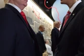 Face-à-face entre les personnages de cire à l'effigie de Donald Trump (g) et Barack Obama, le 19 janvier 2017 au musée Grévin à Paris