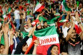 Des supportrices iraniennes assistent, sur écran géant au stade Azadi à Téhéran, au match contre le Portugal au Mondial, le 25 juin 2018