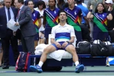 Le Serbe Novak Djokovic, après sa défaite face au Russe Daniil Medvedev en finale de l'US Open, qui le prive du Grand Chelem calendaire, le 12 septembre 2021 à New York