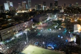 Des dizaines de milliers de personnes participent à Tel-Aviv au grand rassemblement annuel pour la paix organisé à l'occasion de l'anniversaire de l?assassinat de l'ex-Premier ministre israélien Yitzhak Rabin, le 5 novembre 2016
