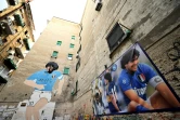 Peinture mural et photos de Diego Maradona, dans le quartier Spagnoli à Naples, le 20 novembre 2019