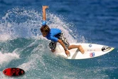 Le Réunionnais Jérémy Florès champion de France et d'Europe minimes de surf, en vacances dans son île en décembre 2001
