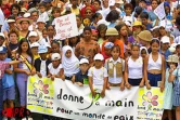 15 000 personnes ont participé dimanche matin 7 octobre 2001 à une marche pour la paix àSaint-Denis. L'action était organisée en réaction à la situation de crise engendrée par les attentats meurtriers du 11 septembre 2001 aux Etats-Unis