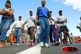 Mardi 12 août 2003
La marche a été organisée pour protester contre la baisse des quotas de CES