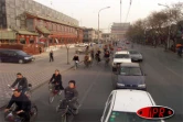 Lundi 3 avril 2006- 
Scènes de vie matinale dans les rues de la capitale chinoise