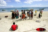 Au retour des pêcheurs, le poisson est vendu sur la plage de Ramena