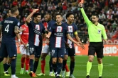 Ligue 1: le Paris SG à dix sauve un point à Reims