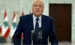 Photo fournie par l'agence Dalati & Nohra montrant le Premier ministre libanais désigné, Najib Mikati, au palais présidentiel de Baabda, le 26 juillet 2021