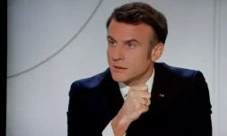 Le président Emmanuel Macron lors d'un entretien sur TF1 et France 2 retransmis à la télévision, le 14 mars 2024 à Paris ( AFP / Ludovic MARIN )