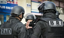 Des membres du RAID et de la BRI lors de l'assaut à Saint-Denis le 18 novembre 2015 aprÚs les attentats de Paris le 13 novembre 2015 sur une photo diffusée par le ministÚre de l'Intérieur le 20 novembre 2015
