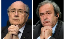 Sepp Blatter, alors président de la Fifa (g), le 30 mai 2015, et le dirigeant de l'UEFA Michel Platini le 28 mai 2015 à Zurich